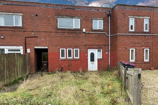 Three-bedroom, mid-terraced house - guide price £15,000-plus.