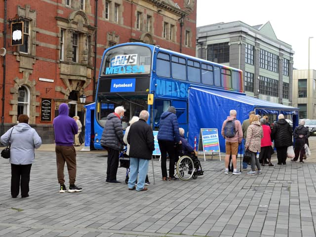 Long queues at the Covid-19 vaccine bus parked up in King Street, South Shields.