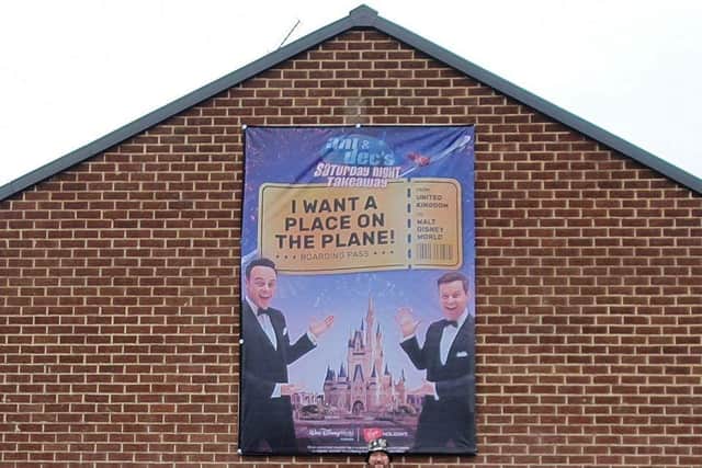 Ant and Dec’s Saturday Night Takeaway inspires Sunderland man to print large poster for the side of his house in a bid to win tickets for a place on the plane to Disney World, Florida.