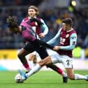 BURNLEY, ENGLAND - JANUARY 04: Ivan Toney of Peterborough United is challenged by Matthew Lowton of Burnley during the FA Cup Third Round match between Burnley FC and Peterborough United at Turf Moor on January 04, 2020 in Burnley, England. (Photo by Nathan Stirk/Getty Images)