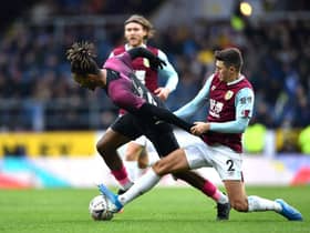 BURNLEY, ENGLAND - JANUARY 04: Ivan Toney of Peterborough United is challenged by Matthew Lowton of Burnley during the FA Cup Third Round match between Burnley FC and Peterborough United at Turf Moor on January 04, 2020 in Burnley, England. (Photo by Nathan Stirk/Getty Images)