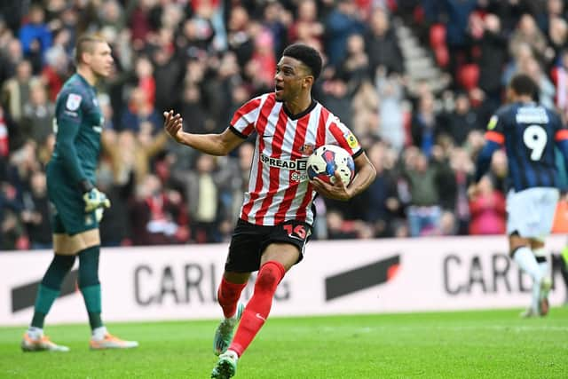 Amad celebrates his equaliser against Luton Town