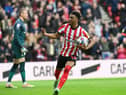 Amad celebrates his equaliser against Luton Town