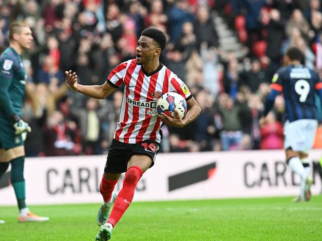 Amad celebrates his equaliser against Luton Town