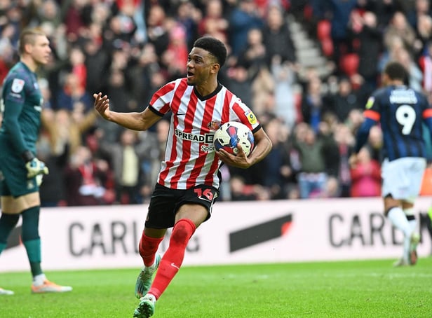 Amad celebrates his equaliser against Luton Town