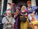 Su Pollard takes centre stage with the cast of Snow White and the Seven Dwarfs. Picture by David Wood.