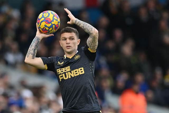 Newcastle United's English defender Kieran Trippier prepares to take a throw-in during the English Premier League football match between Leeds United and Newcastle United at Elland Road in Leeds, northern England on January 22, 2022. (Photo by PAUL ELLIS/AFP via Getty Images)