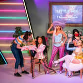 A staff members put the finishing touches to the wax figures of Little Mix. From left to right, Leigh-Anne Pinnock, Jesy Nelson, Perrie Edwards and Jade Thirlwall. Picture: Aaron Chown/PA Wire.