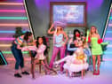 A staff members put the finishing touches to the wax figures of Little Mix. From left to right, Leigh-Anne Pinnock, Jesy Nelson, Perrie Edwards and Jade Thirlwall. Picture: Aaron Chown/PA Wire.