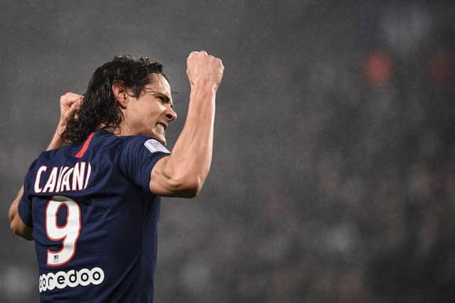 TOPSHOT - Paris Saint-Germain's Uruguayan forward Edinson Cavani reacts after scoring a goal during the French L1 football match between Paris Saint-Germain (PSG) and Girondins de Bordeaux at the Parc des Princes stadium in Paris, on February 23, 2020. (Photo by FRANCK FIFE / AFP) (Photo by FRANCK FIFE/AFP via Getty Images)