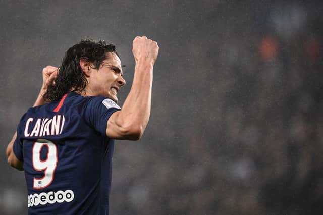 TOPSHOT - Paris Saint-Germain's Uruguayan forward Edinson Cavani reacts after scoring a goal  during the French L1 football match between Paris Saint-Germain (PSG) and Girondins de Bordeaux at the Parc des Princes stadium in Paris, on February 23, 2020. (Photo by FRANCK FIFE / AFP) (Photo by FRANCK FIFE/AFP via Getty Images)