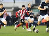 Patrick Roberts in action at The Den