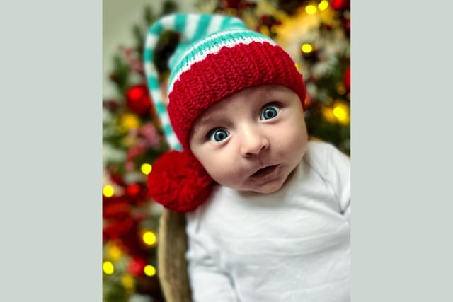 Felix, age 3 months, ready to celebrate his first Christmas.