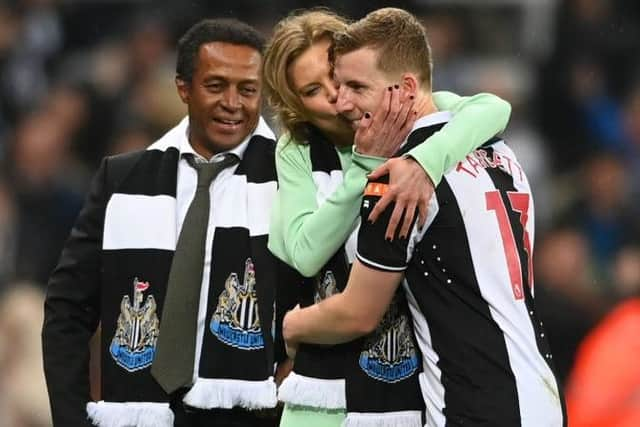 Amanda Staveley, Director of Newcastle United gives Matt Targett of Newcastle United a kiss following their victory in the Premier League match between Newcastle United and Arsenal at St. James Park on May 16, 2022 in Newcastle upon Tyne, England. (Photo by Stu Forster/Getty Images)