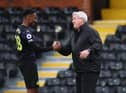 LONDON, ENGLAND - MAY 23: Steve Bruce manager of Newcastle United with Joe Willock after the Premier League match between Fulham and Newcastle United at Craven Cottage on May 23, 2021 in London, United Kingdom. (Photo by Marc Atkins/Getty Images)