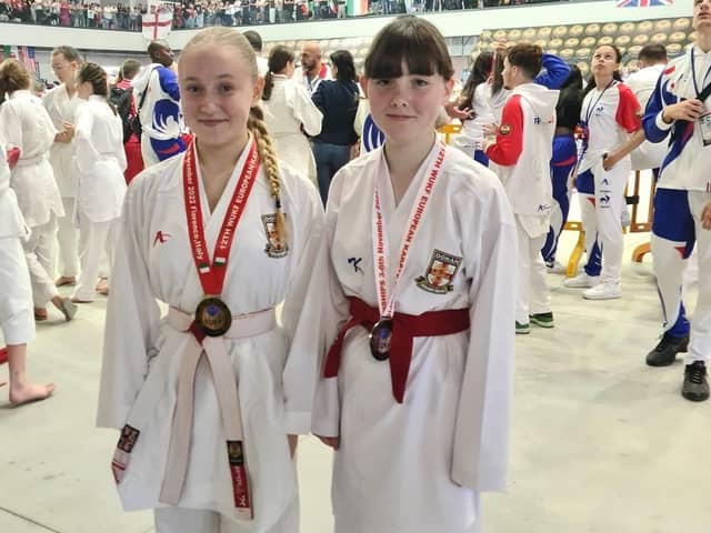 Dokan medallists Rebecca Davis, left, and Grace Young.