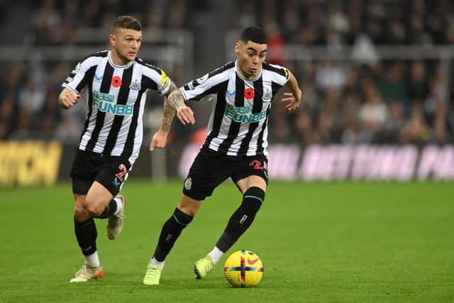 Newcastle player Miguel Almiron in action with Kieran Trippier in support during the Premier League match between Newcastle United and Chelsea FC at St. James Park on November 12, 2022 in Newcastle upon Tyne, England. (Photo by Stu Forster/Getty Images)