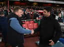 Arsenal manager Mikel Arteta shakes hands with Newcastle United head coach Eddie Howe.