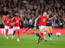 Bruno Guimaraes of Newcastle United is challenged by Jonjo Shelvey of Nottingham Forest during the Premier League match between Nottingham Forest and Newcastle United at City Ground on March 17, 2023 in Nottingham, England. (Photo by Shaun Botterill/Getty Images)
