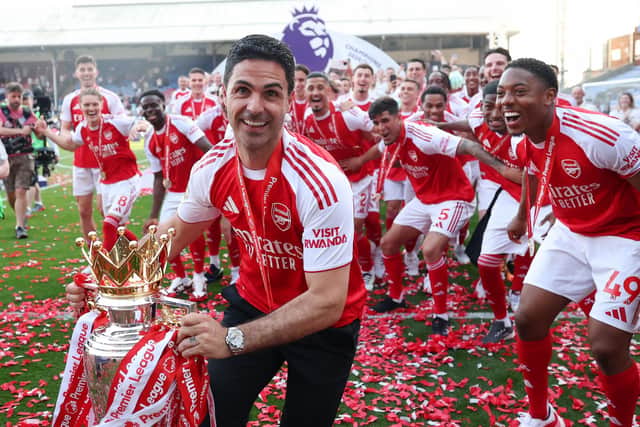 Arsenal manager Mikel Arteta leading the Premier League trophy celebrations. (Photo by Michael Regan/Getty Images For Premier League)