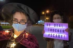 The protesters dressed up in Halloween outfits for their event outside Nissan.