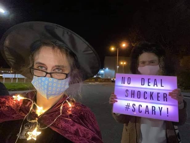 The protesters dressed up in Halloween outfits for their event outside Nissan.