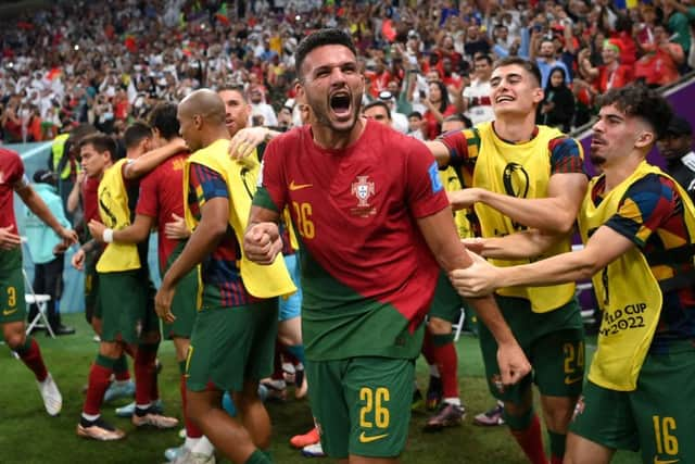 Goncalo Ramos of Portugal celebrates after scoring the team's first goal during the FIFA World Cup Qatar 2022 Round of 16 match between Portugal and Switzerland at Lusail Stadium on December 06, 2022 in Lusail City, Qatar. (Photo by Justin Setterfield/Getty Images)