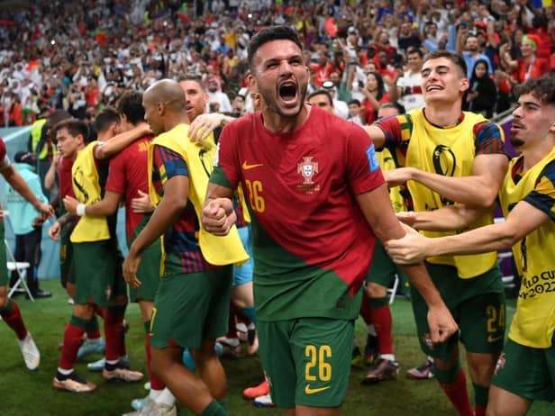Goncalo Ramos of Portugal celebrates after scoring the team's first goal during the FIFA World Cup Qatar 2022 Round of 16 match between Portugal and Switzerland at Lusail Stadium on December 06, 2022 in Lusail City, Qatar. (Photo by Justin Setterfield/Getty Images)
