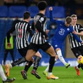 Timo Werner of Chelsea shoots during the Premier League match between Chelsea and Newcastle United at Stamford Bridge .