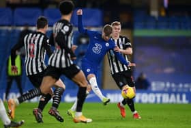 Timo Werner of Chelsea shoots during the Premier League match between Chelsea and Newcastle United at Stamford Bridge .