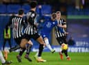 Timo Werner of Chelsea shoots during the Premier League match between Chelsea and Newcastle United at Stamford Bridge .