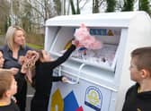 Fatfield Academy Inspires Deputy Headteacher Nicky Dowdle with members of the Eco Warrior team donating items at the new clothing recycling station.