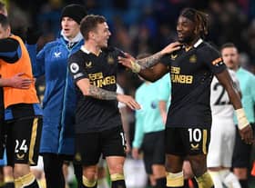 Allan Saint-Maximin and Kieran Trippier celebrate after the Premier League match between Leeds United and Newcastle United (Photo by Stu Forster/Getty Images)