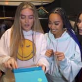(from left) Perrie, Leigh-Anne and Jade open their nomination envelope