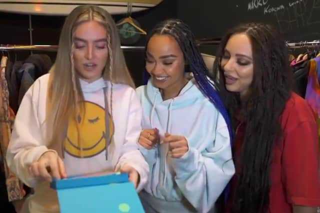 (from left) Perrie, Leigh-Anne and Jade open their nomination envelope