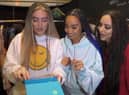 (from left) Perrie, Leigh-Anne and Jade open their nomination envelope
