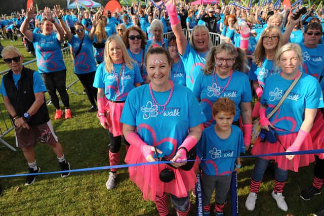 Walkers, many sporting eye-catching costumes or Alzheimer’s Society branded-T-shirts, turned the stunning coastal walk into a sea of blue to remember and support those close to their hearts.