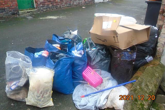 Quantity of rubbish dumped behind West Park Road, South Shields.