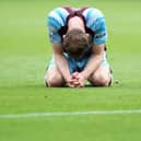 Nathan Collins of Burnley looks dejected following defeat and relegation to the Sky Bet Championship following the Premier League match between Burnley and Newcastle United at Turf Moor on May 22, 2022 in Burnley, England. (Photo by Jan Kruger/Getty Images)