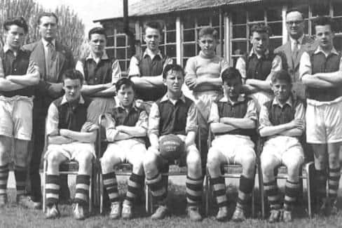 Michael Lynch (centre) was captain of the Senior Football Team at St Aloysius school in 1957-58.