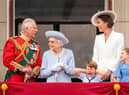 Then Prince of Wales (now King Charles III), Queen Elizabeth II, Prince Louis, the then Duchess of Cambridge (now the Princess of Wales)and Princess Charlotte on the balcony of Buckingham Palace after the Trooping the Colour ceremony at Horse Guards Parade, central London.
