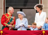 Then Prince of Wales (now King Charles III), Queen Elizabeth II, Prince Louis, the then Duchess of Cambridge (now the Princess of Wales)and Princess Charlotte on the balcony of Buckingham Palace after the Trooping the Colour ceremony at Horse Guards Parade, central London.
