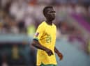 Garang Kuol of Australia looks on during the FIFA World Cup Qatar 2022 Round of 16 match between Argentina and Australia at Ahmad Bin Ali Stadium on December 03, 2022 in Doha, Qatar. (Photo by Robert Cianflone/Getty Images for Football Australia)