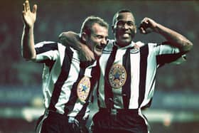 Newcastle strikers Alan Shearer (l) and Les Ferdinand celebrate the fourth goal scored by Shearer during the Premier League match between Newcastle United and Manchester United at St Jame's Park on October 20, 1996 in Newcastle, England, Newcastle won the game 5-0. (Photo by Ben Radford/Allsport/Getty Images/Hulton Archive)