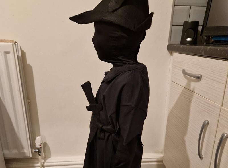 Harlan, 4 dressed as Peter Pan's Shadow.