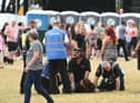Security removing someone from the crowd at the third South Tyneside Festival 2022 gig at Bents Park.