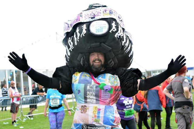 Colin Burgin-Plews, aka the Big Pink Dress, in his latest handcrafted creation after completing the Great North Run in 2018.