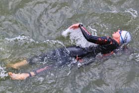 Wear a swimming hat, or two, to help preserve body.