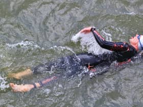 Wear a swimming hat, or two, to help preserve body.