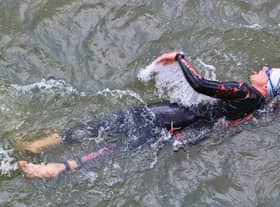 Wear a swimming hat, or two, to help preserve body.